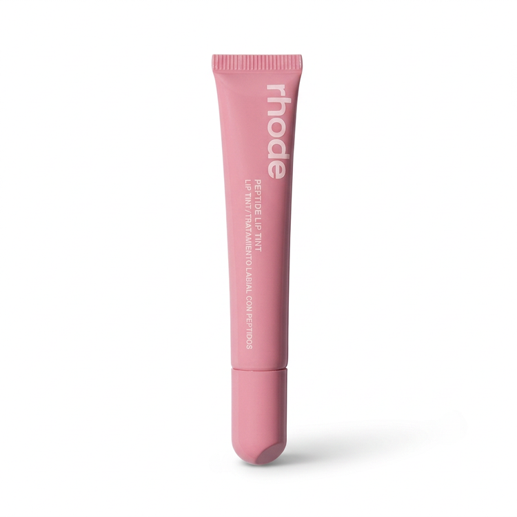 Rhodes Peptide Lip Tint in Ribbon rosy pink squeeze tube on white background